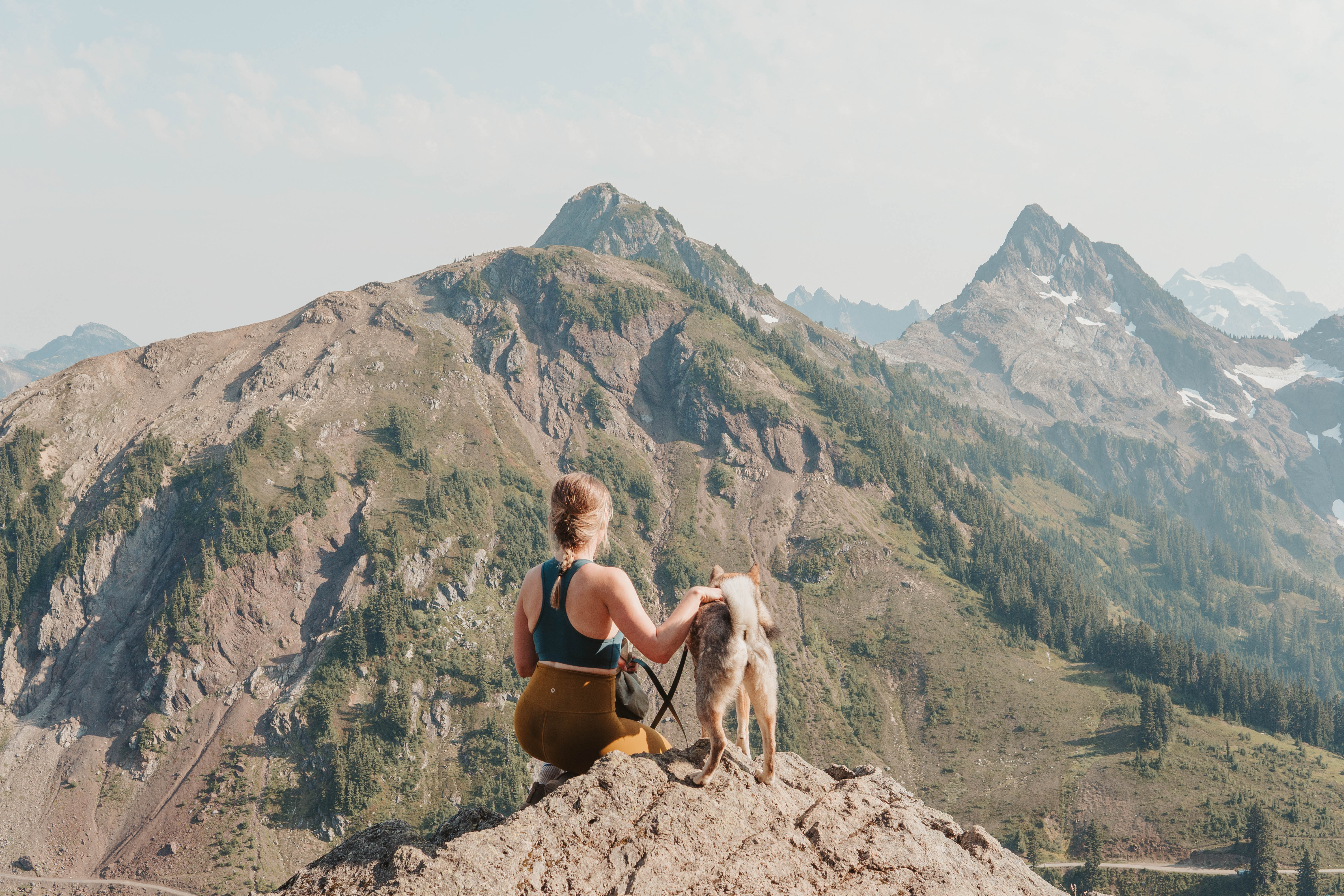 A reflective mountain overlook scene with Sora